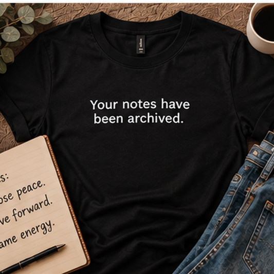 Flat lay lifestyle photo of the Ditching Amy Notes Archived black tee